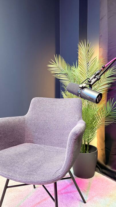 Professional boom arm microphone setup with studio chair